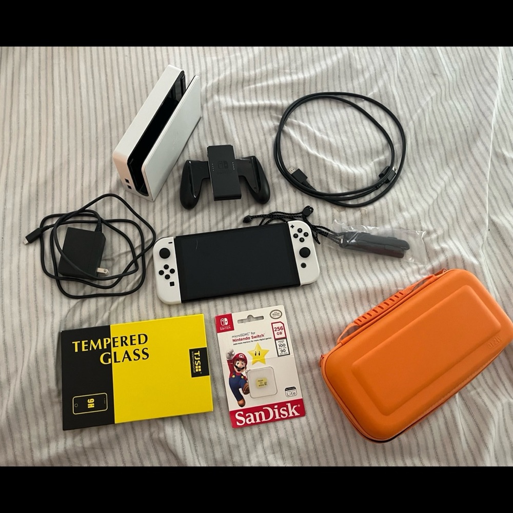 Nintendo Switch OLED Console with accessories- like new! Sold as set.